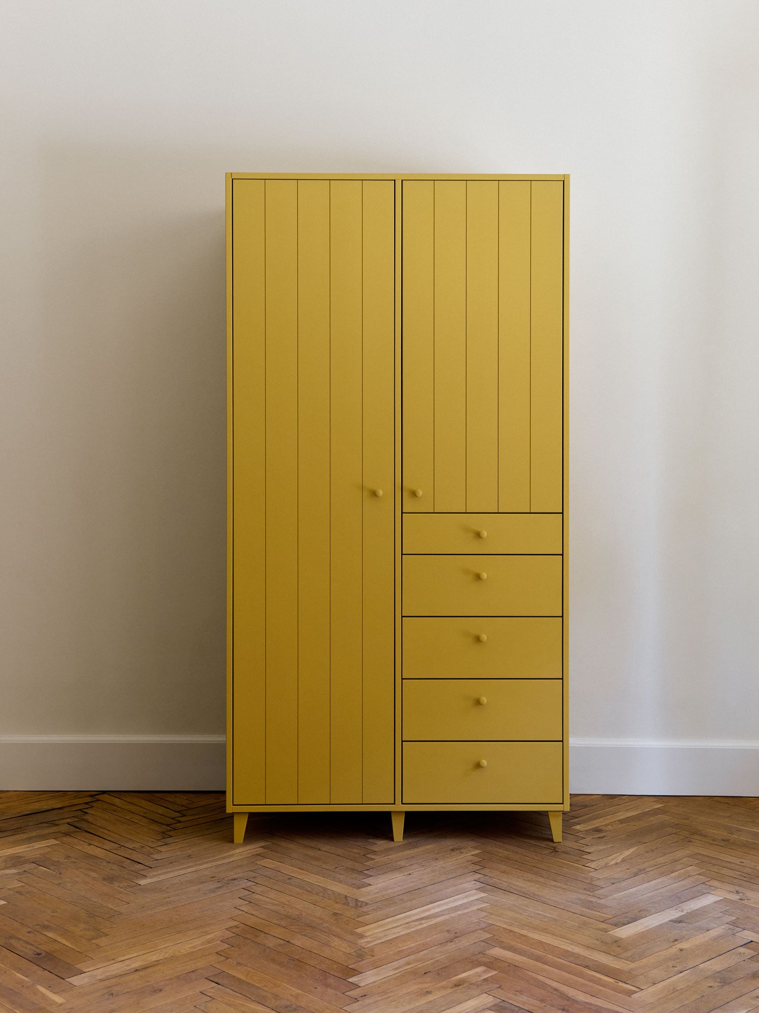 wardrobe with doors and drawers, painted with yellow egg-and-oil tempera