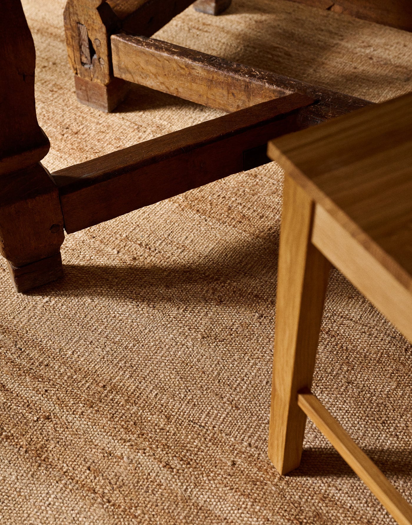 Close-up of hemp rug and table legs